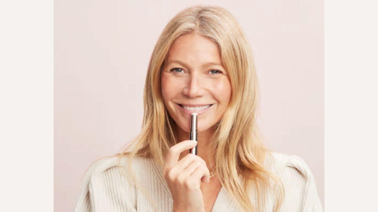 Gweneth Paltrow using Goop Lip Balm