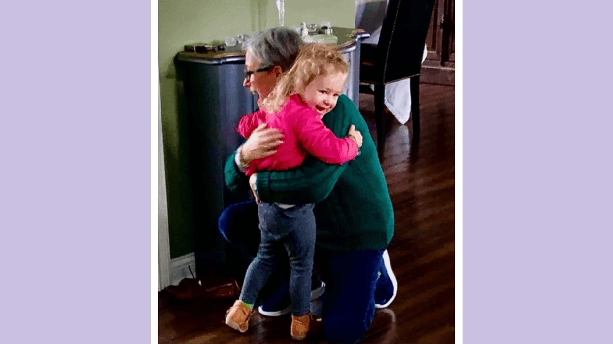 grandma hugging granddaughter