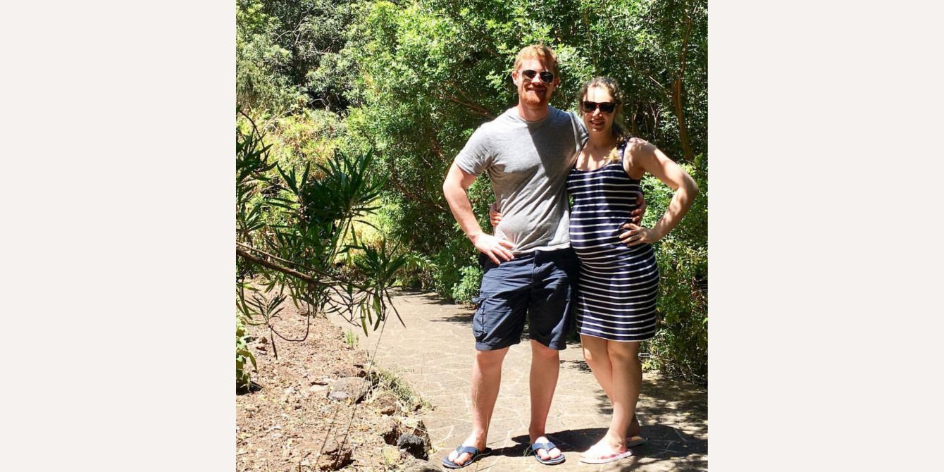 pregnant woman and partner on a hike - essay about postpartum OCD