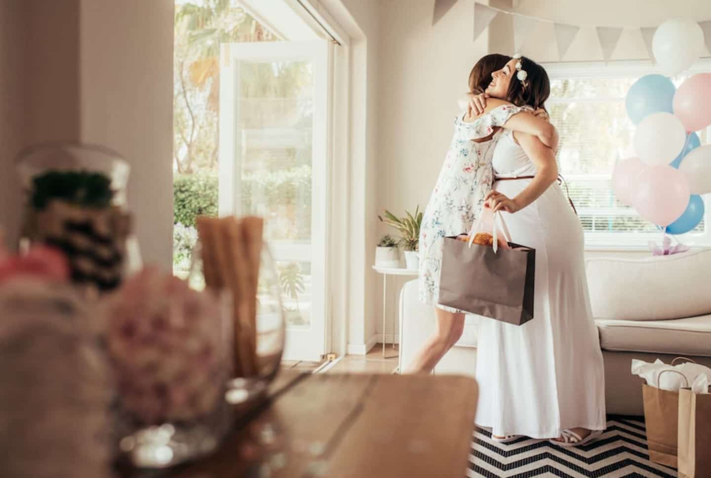 what to wear to a baby showerwhether youre a guest or the mama to be featured Motherly