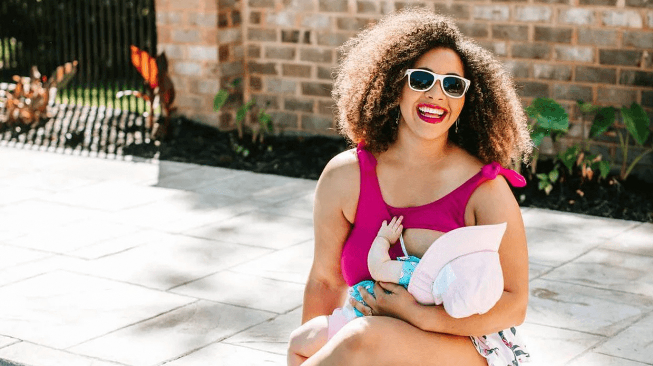 mom breastfeeding baby at the pool