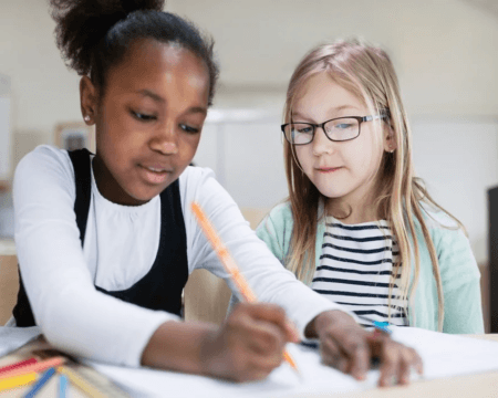 black and white child at school Motherly