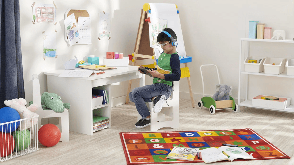 kid doing virtual school at a desk