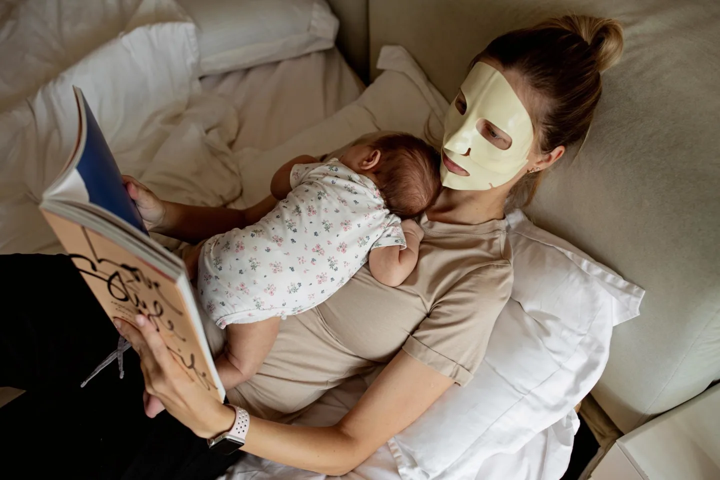 woman wearing face mask with baby on her chest - beauty products under $5