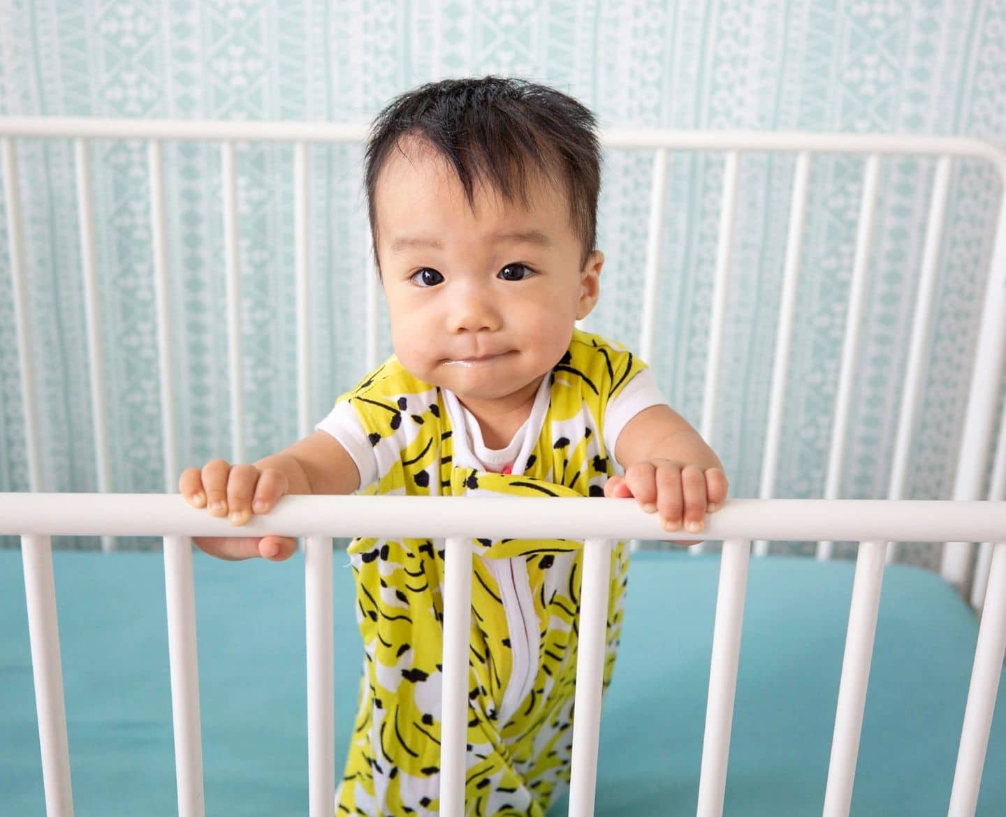 toddler in crib