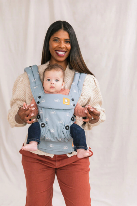 woman wearing baby with Explore Baby Carrier