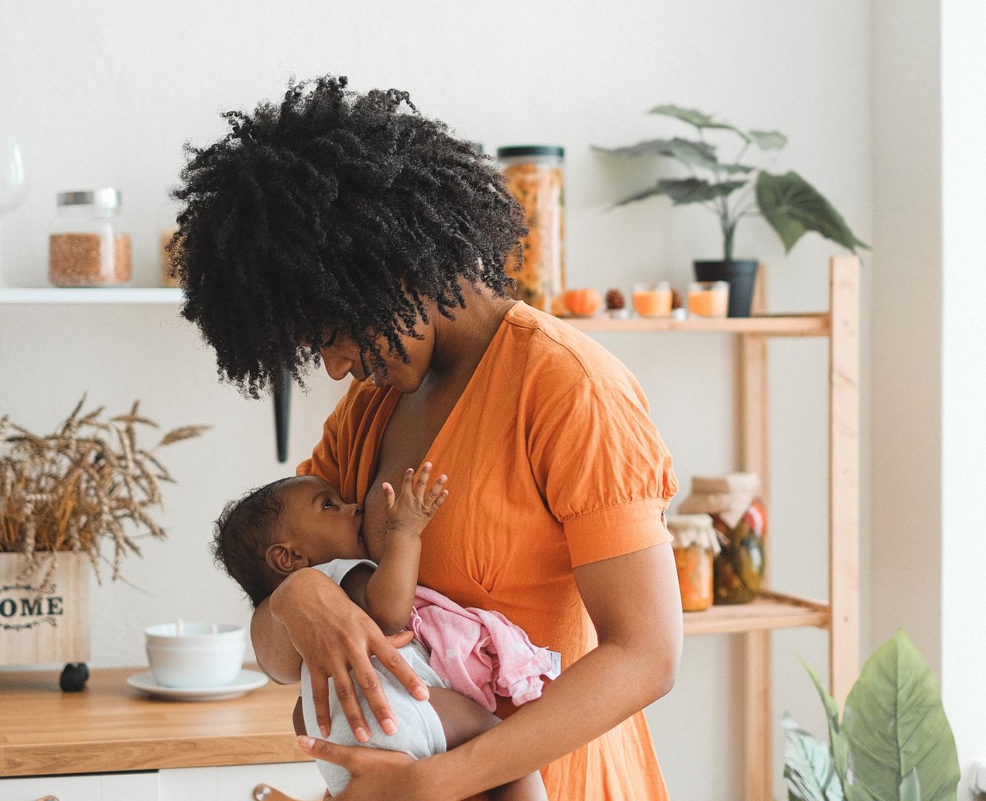 mother breastfeeding baby - lactation cookies