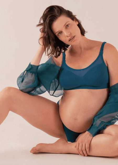 pregnant woman in a bra