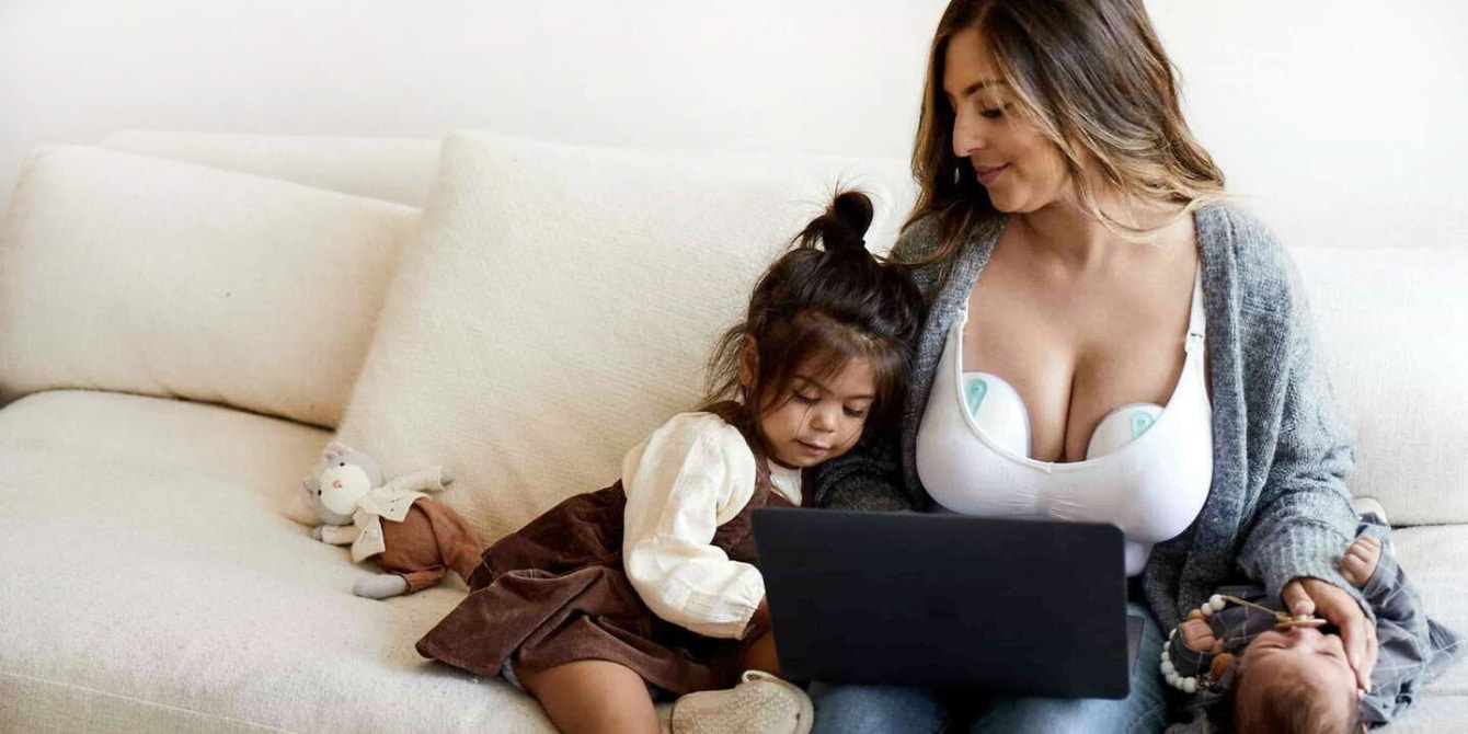 mom-with-baby-and-toddler-wearing-breastpump