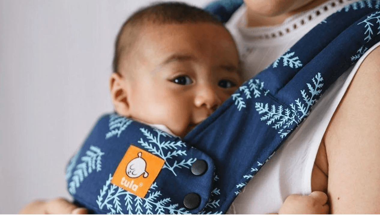 mom wearing a baby in a Tula carrier