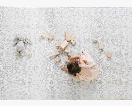 girl playing with blocks Motherly