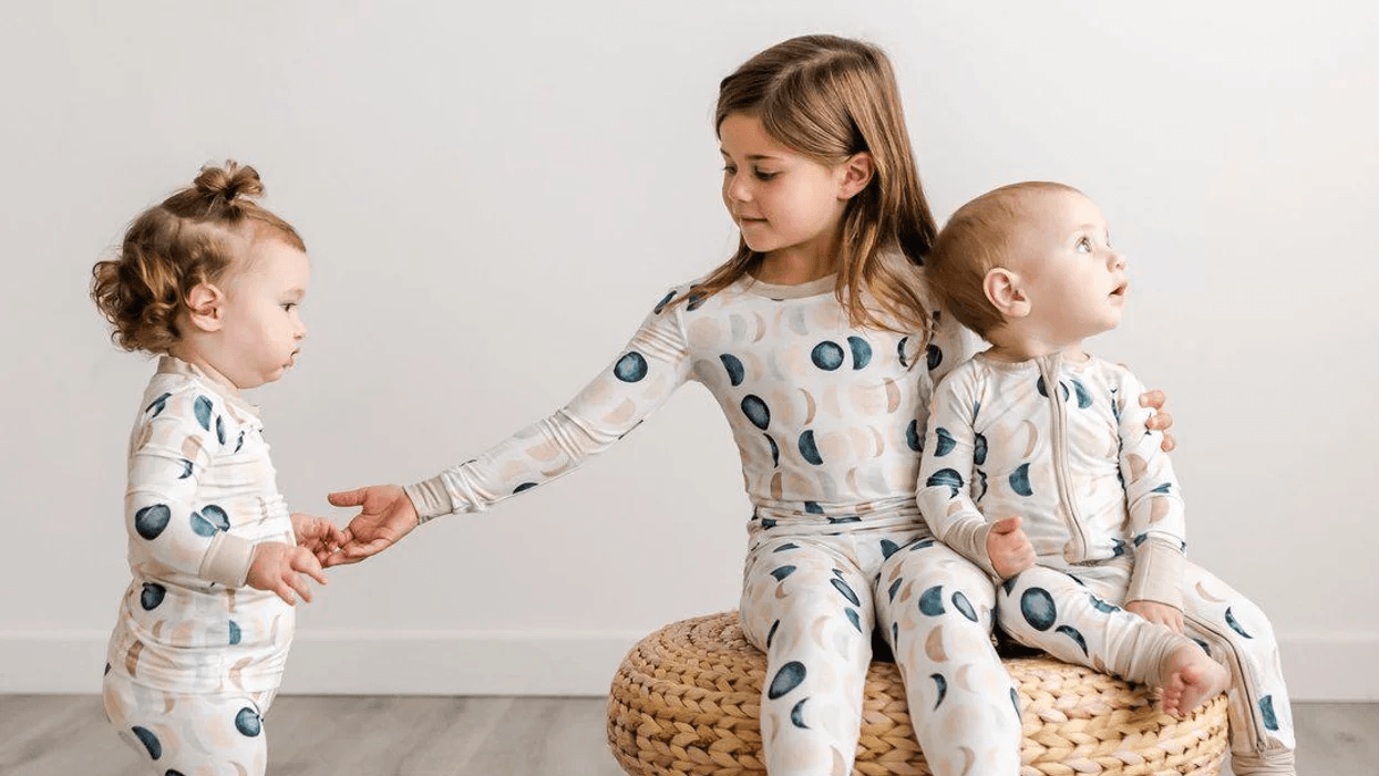 siblings wearing the same pajamas