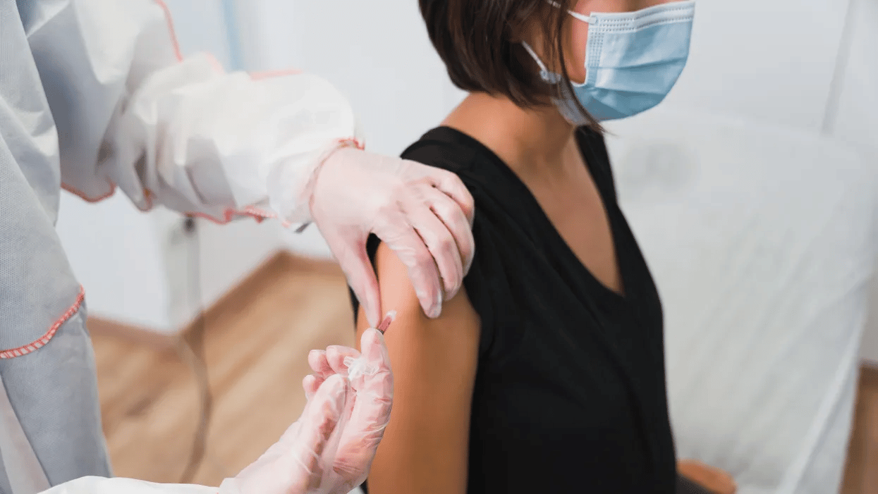 woman getting vaccine