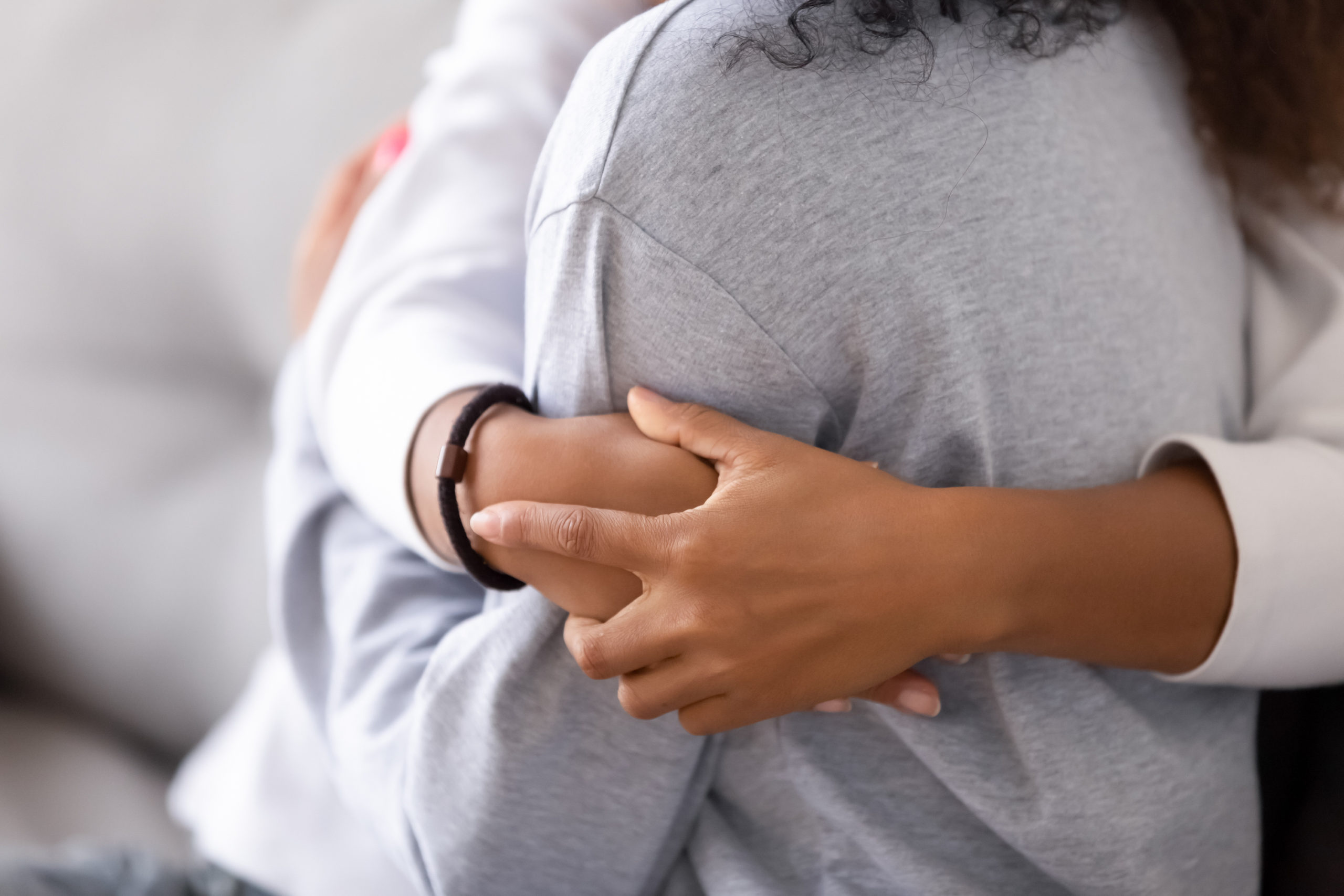 women-hugging because it's hard to know what to say to a friend with breast cancer