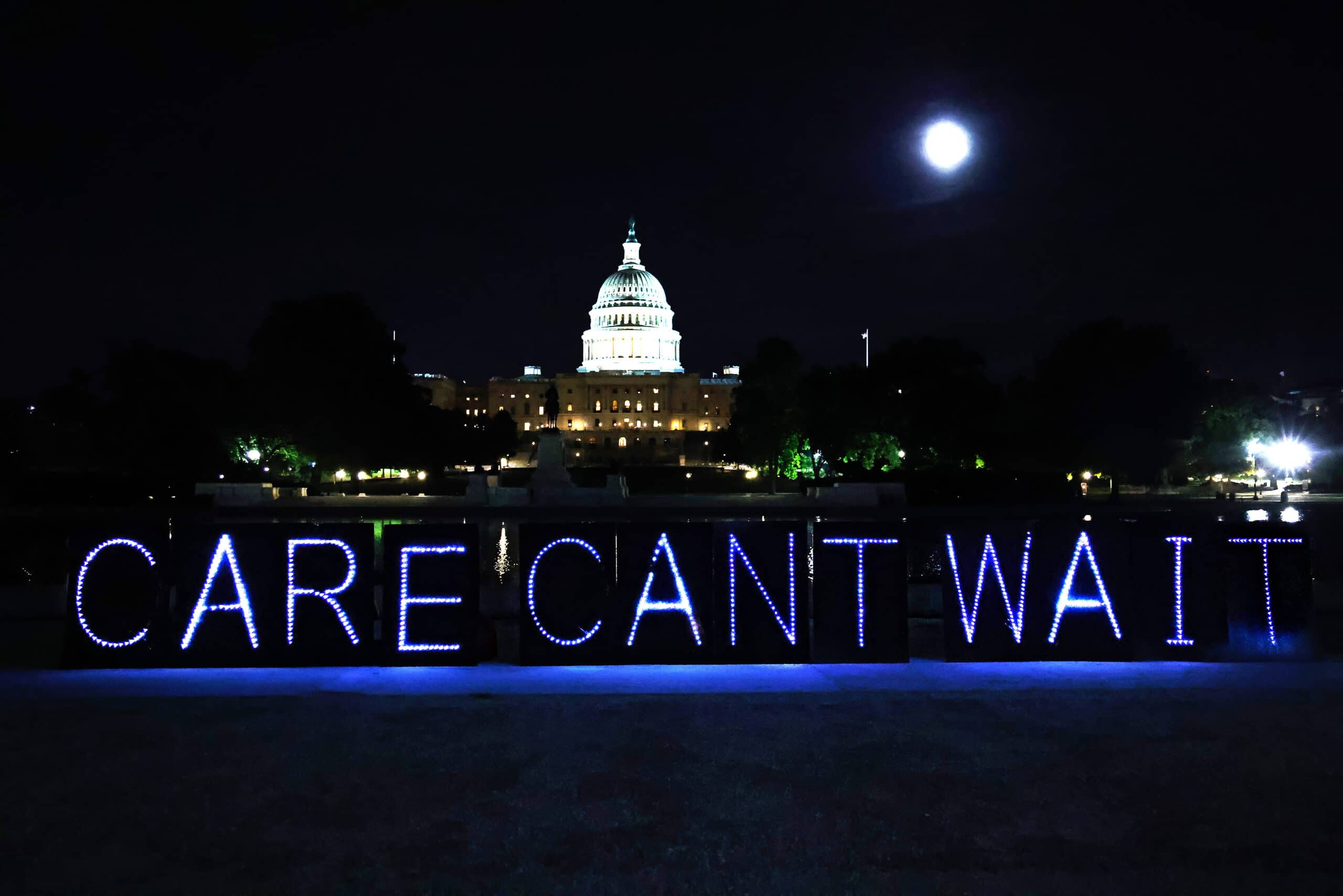 neon-sign-in-front-of-the-capital-building