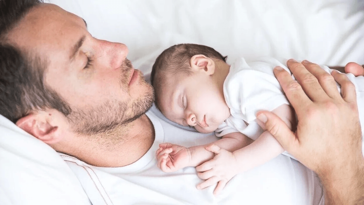 dad and baby on chest