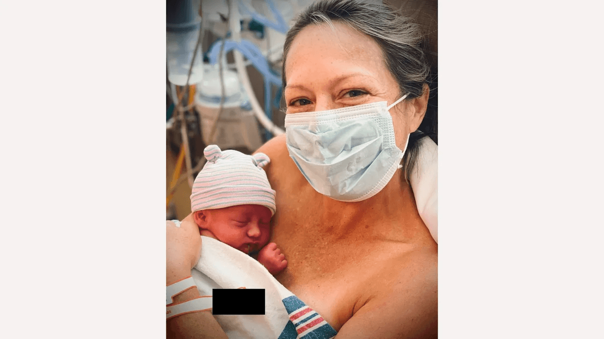 dylan dreyer holding newborn Motherly