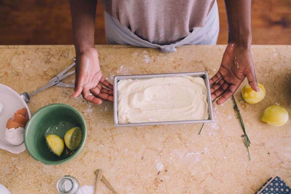 woman baking at home - reconnect with your identity outside motherhood