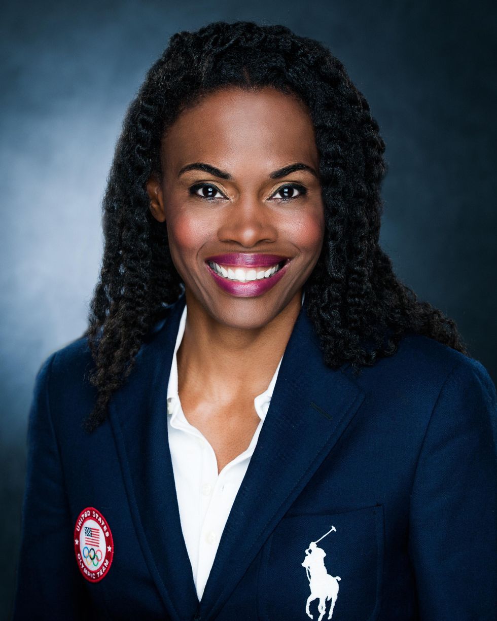 Olympian-Chaunt\u00e9-Lowe-poses-in-team-blazer