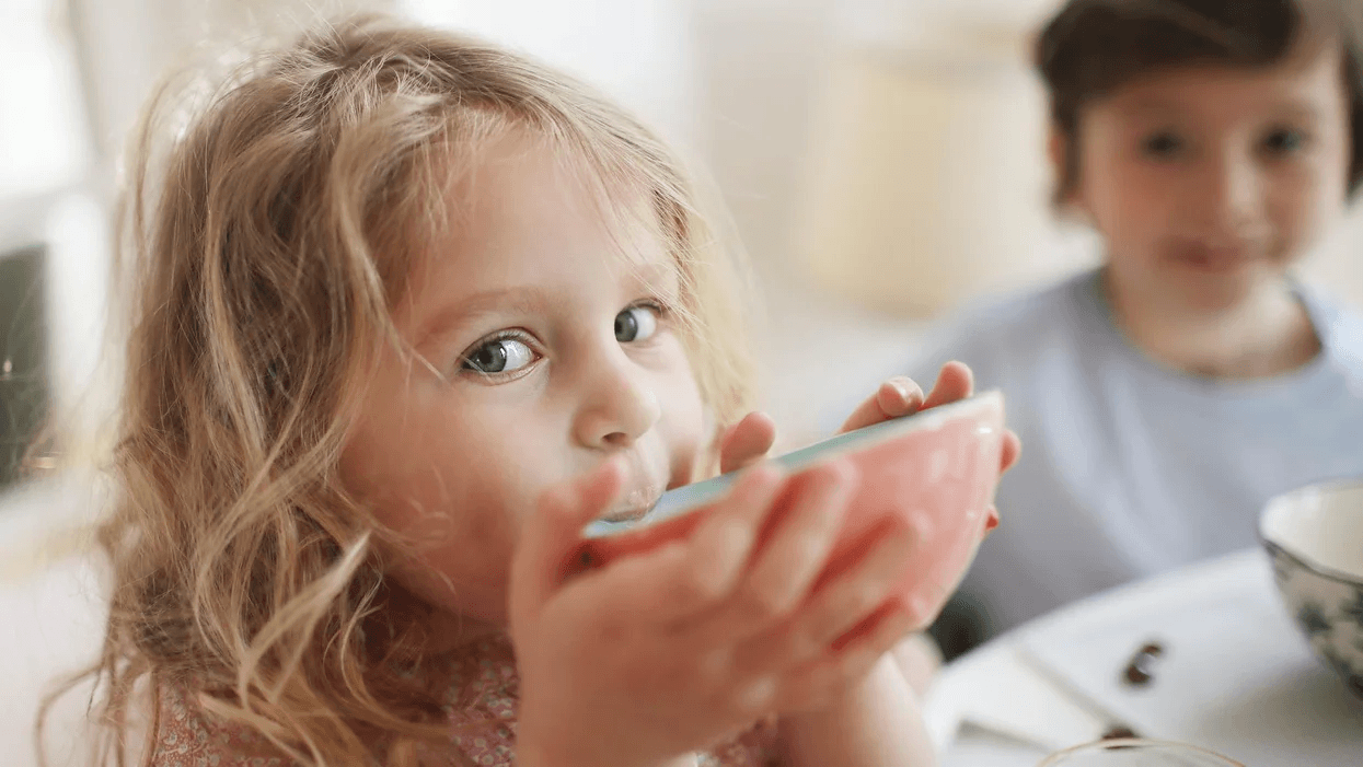 little-girl-slurping-from-a-bowl