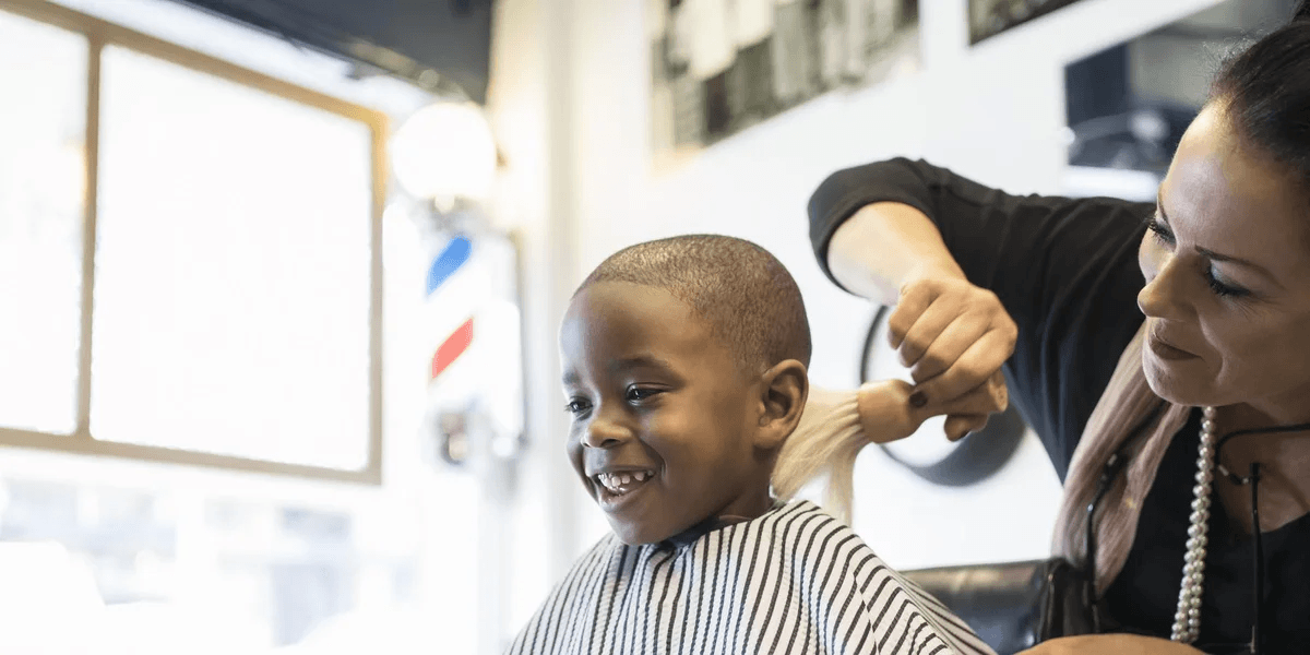 kid getting haircut Motherly