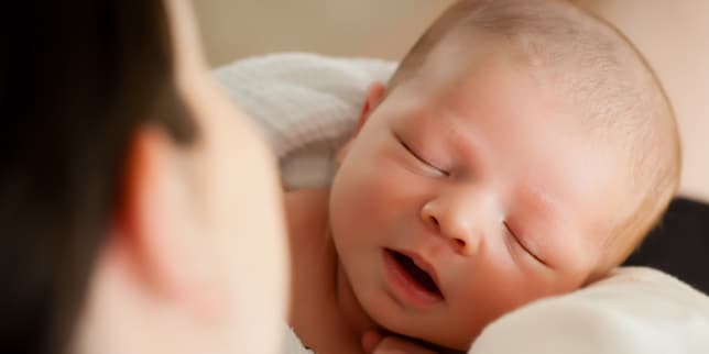 mom looking at baby