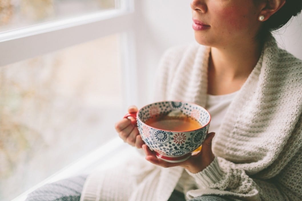 calm mama having cup of tea