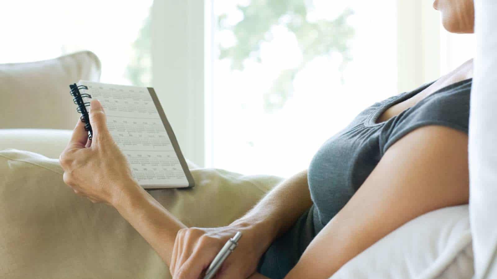 woman reading on the couch