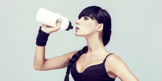 woman and water bottle