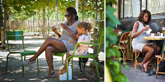 pregnant african american woman and child on bench in Paris