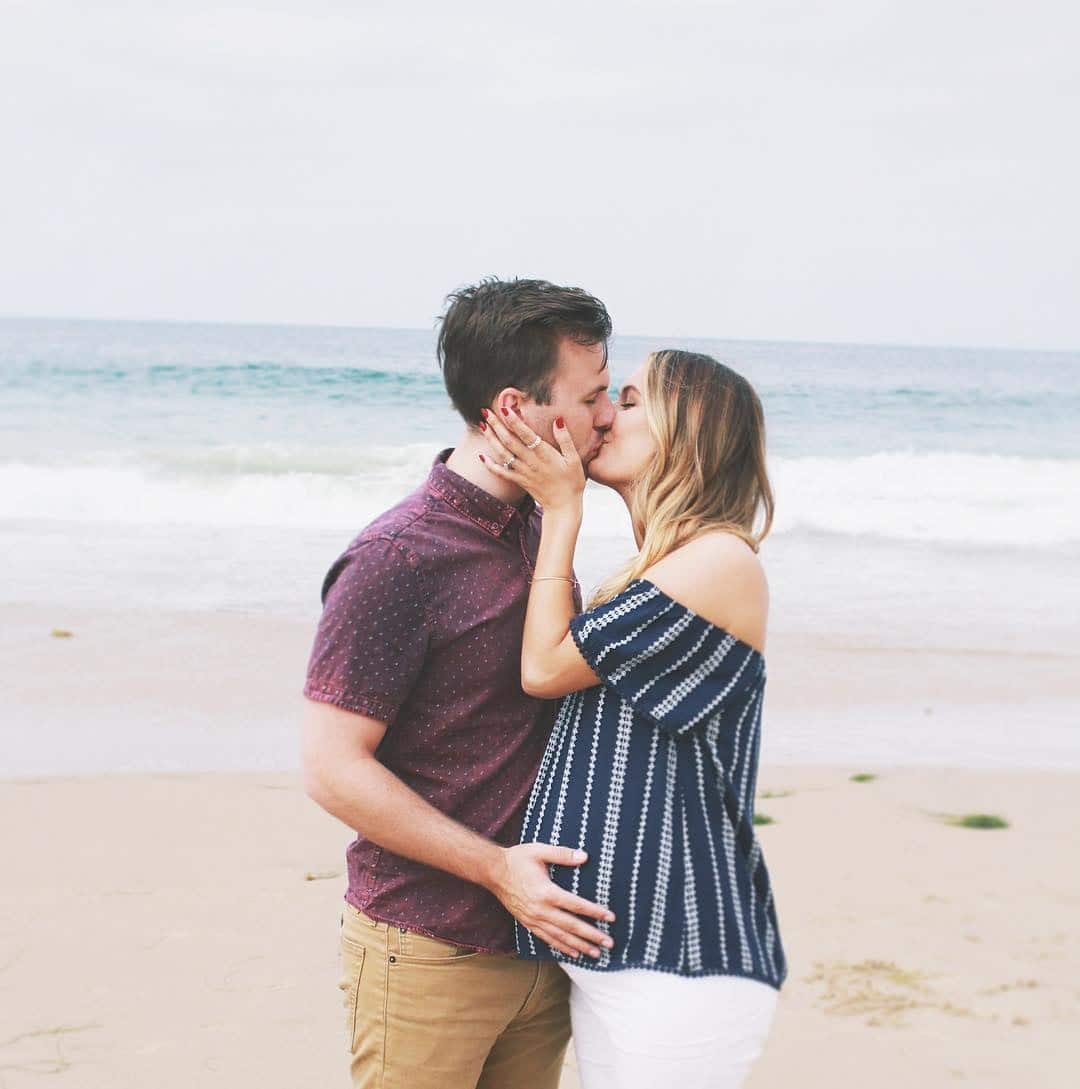 couple kissing on the beach