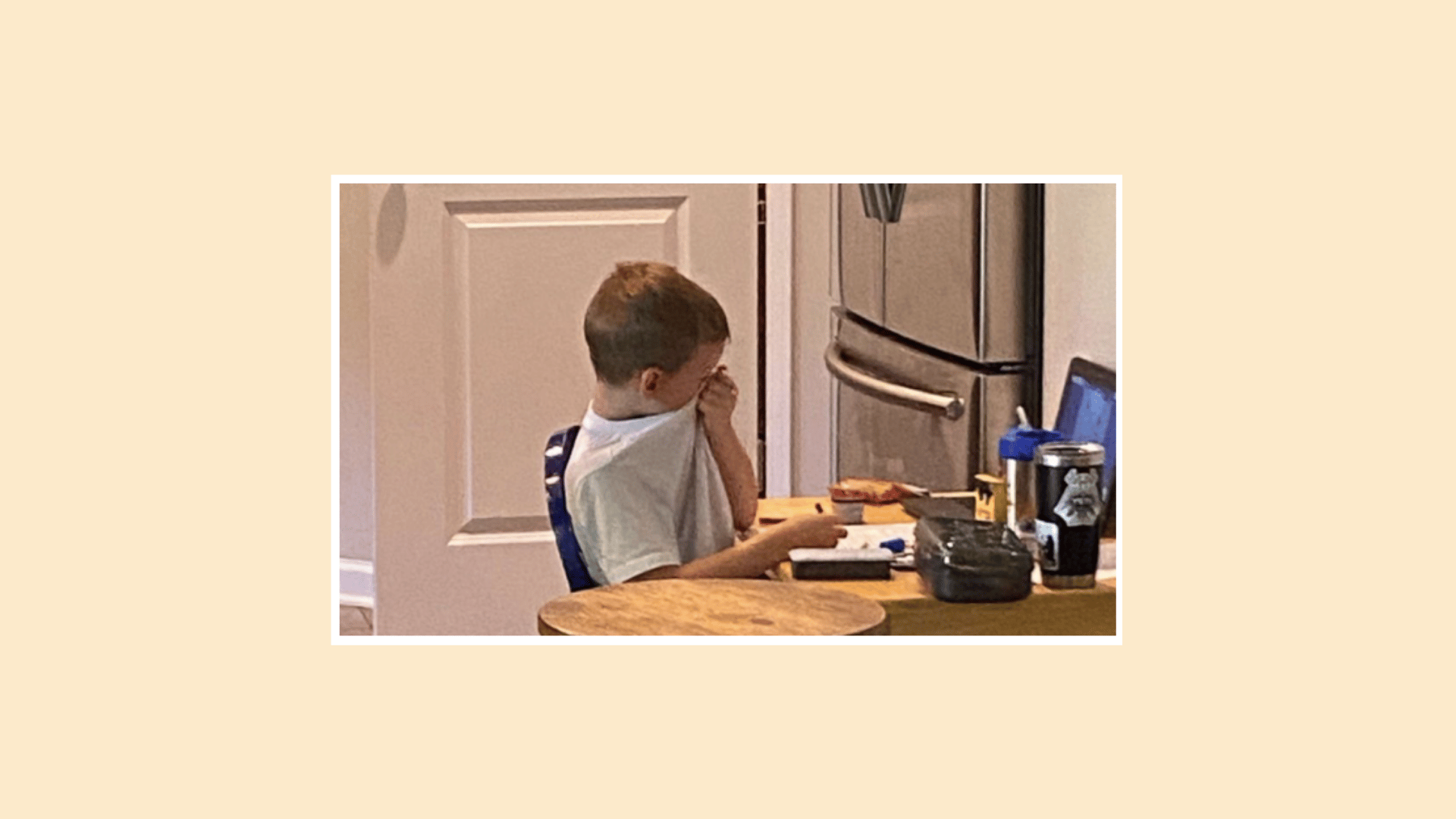 little boy crying over virtual school