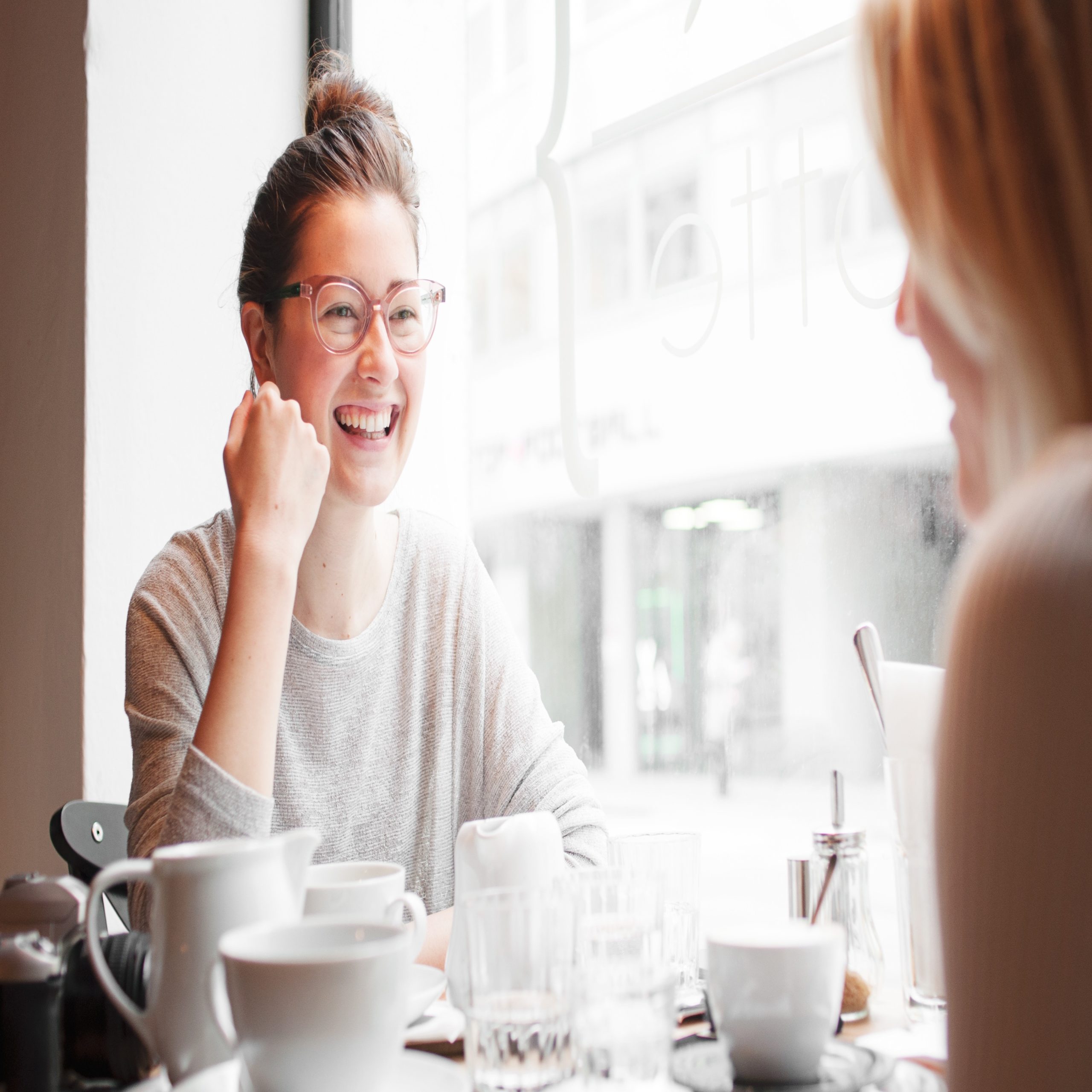 mom friends: two women having coffee