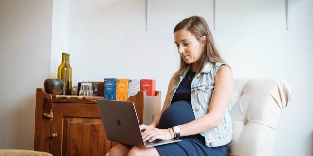 pregnant woman working on laptop