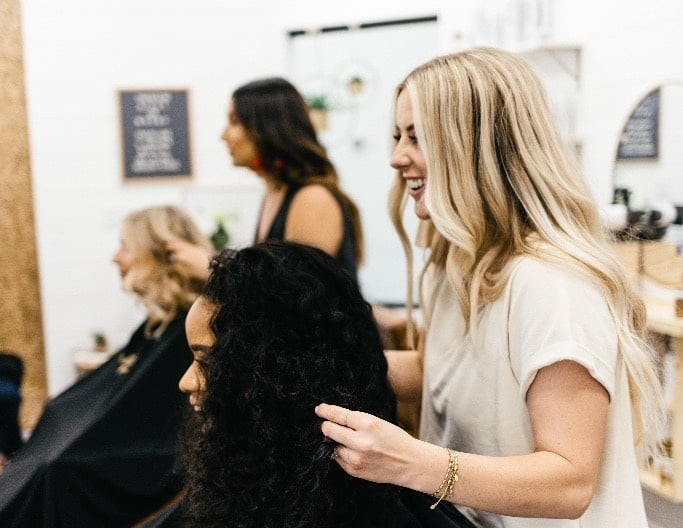 woman sitting in a salon