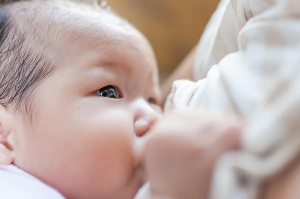 baby breastfeeding - breast milk science