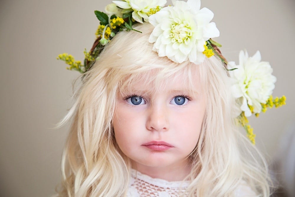 little girl wearing a flower crown