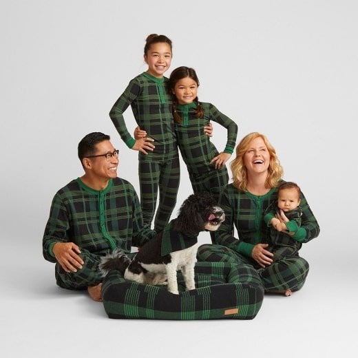 family wearing matching pajamas