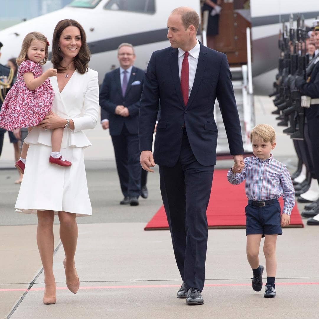 kate middleton and family walking on tarmac