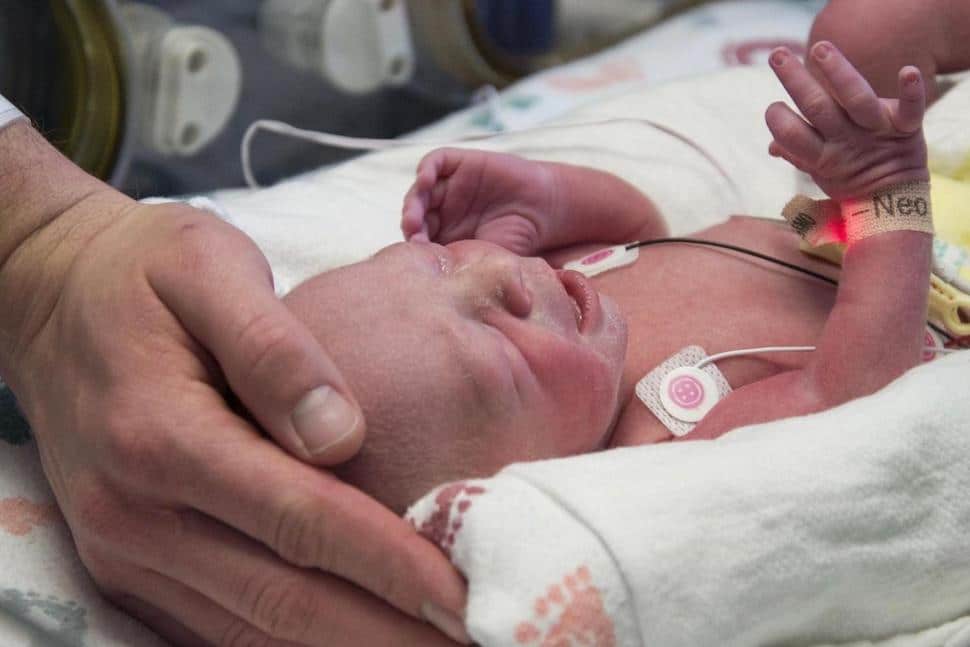 uterus transplant birth: newborn baby in hospital