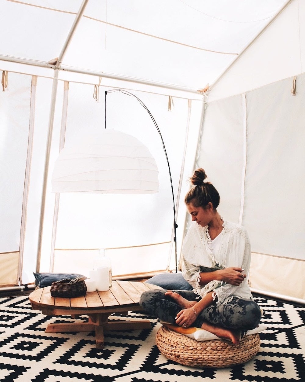 mom playing with kids in a tent