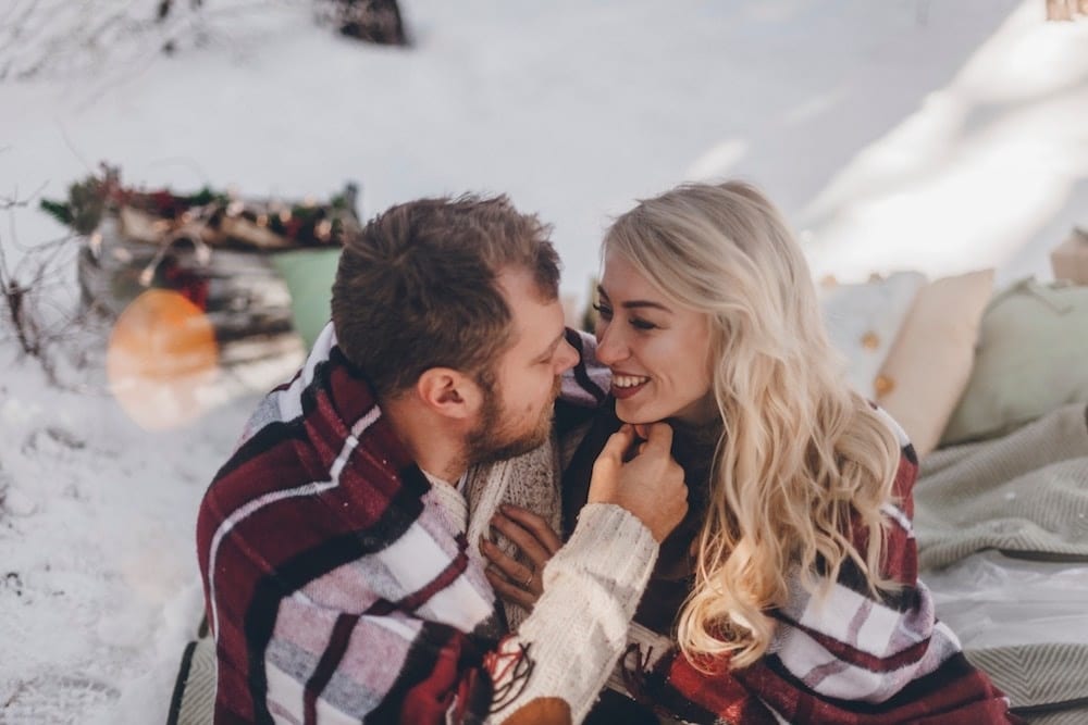 husband and wife about to kiss