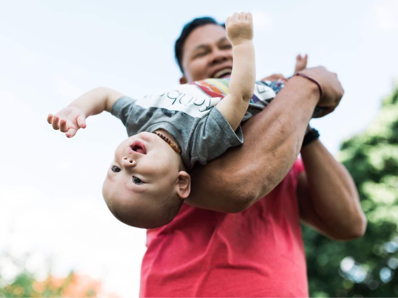 Dad plays with child - It’s OK to let your partner be their own parent