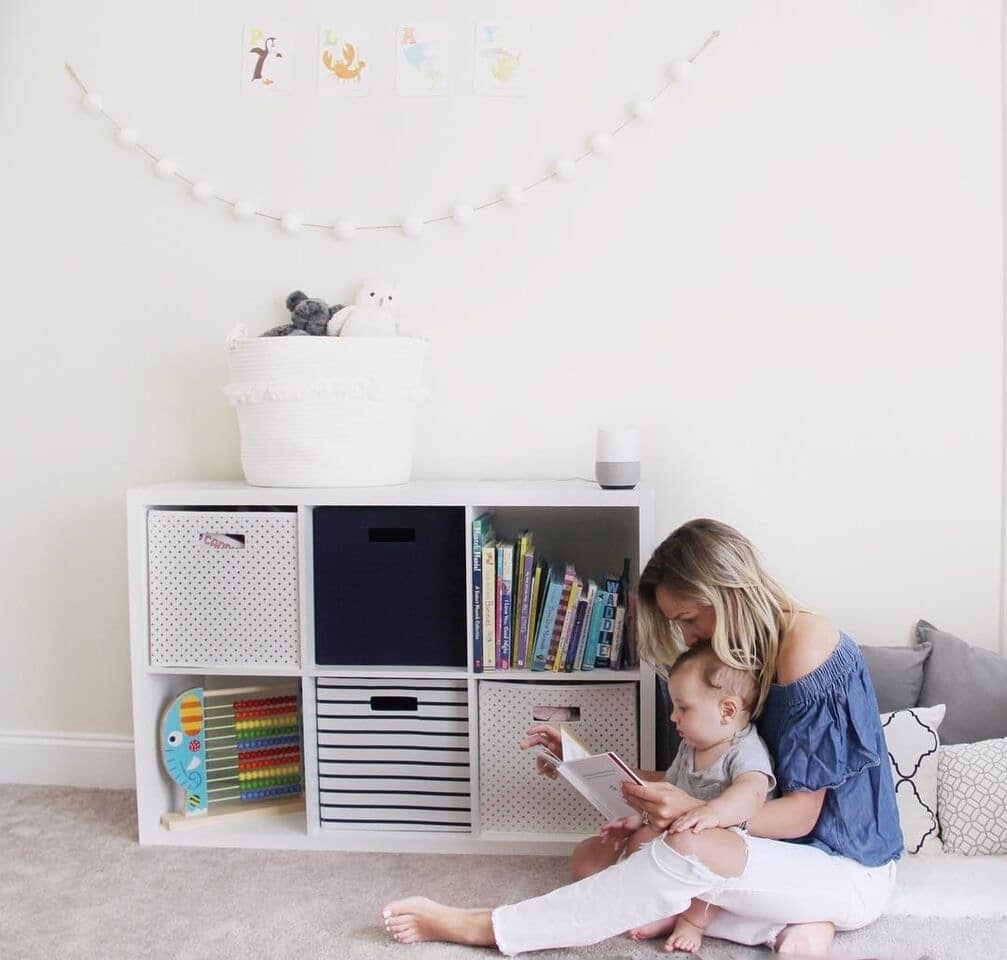 mom playing with child on the floor