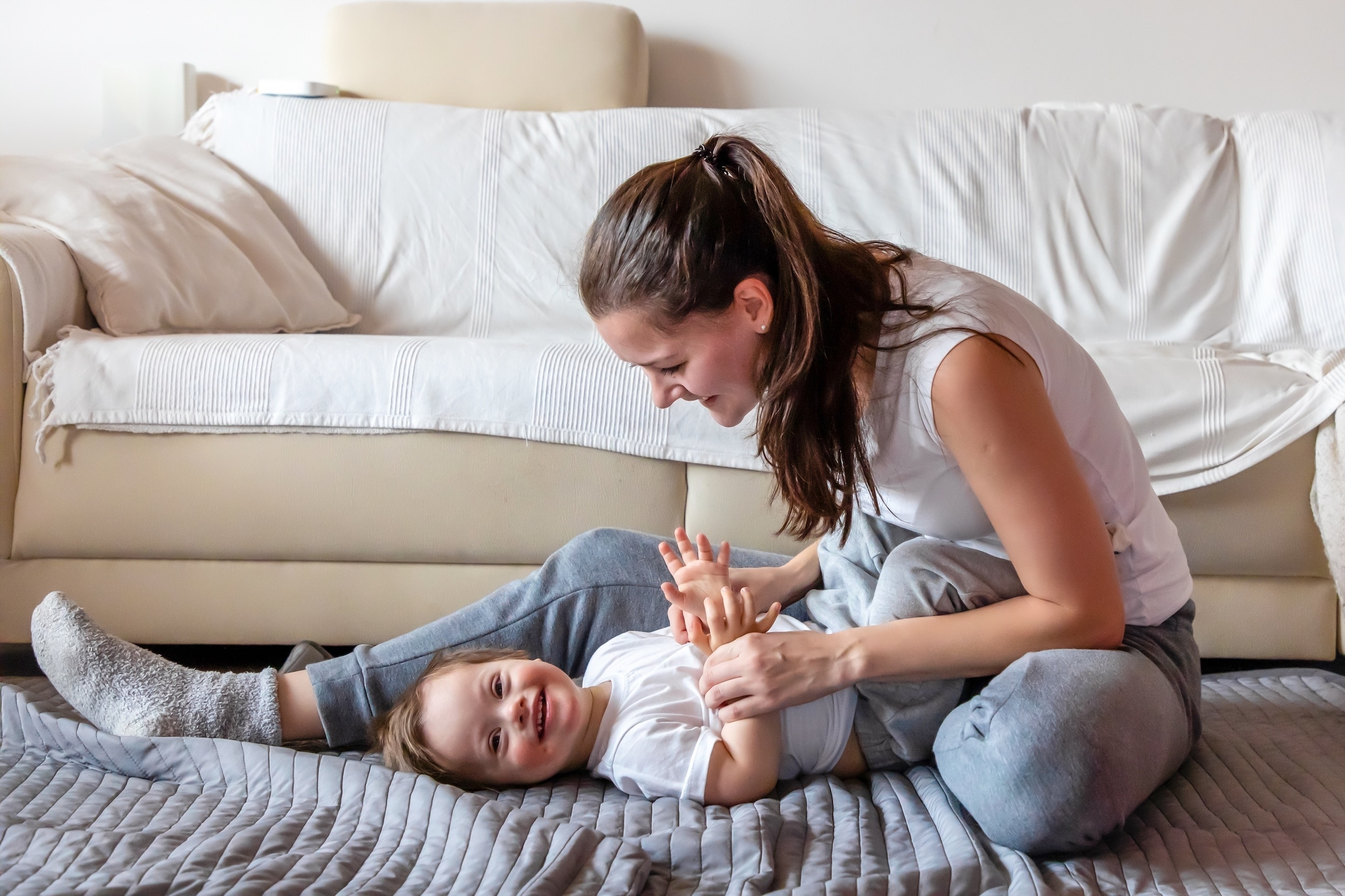 Woman sitting down with baby