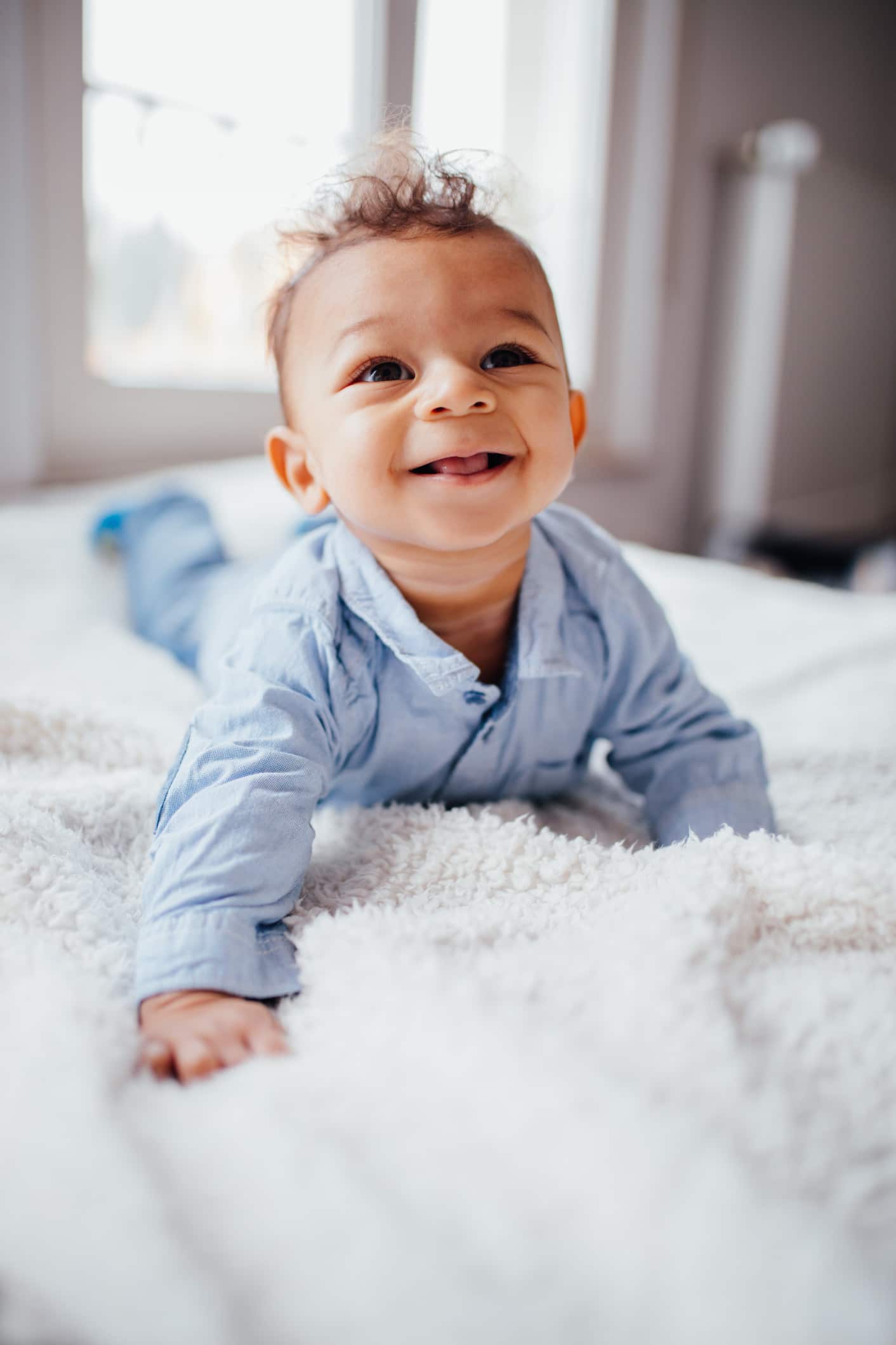 little boy doing tummy time