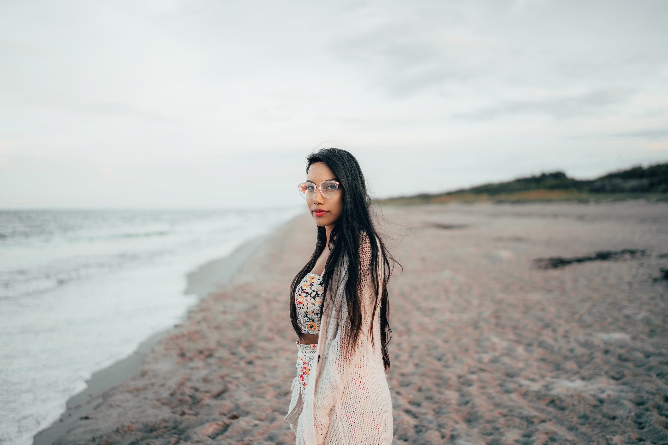 woman standing on a beach