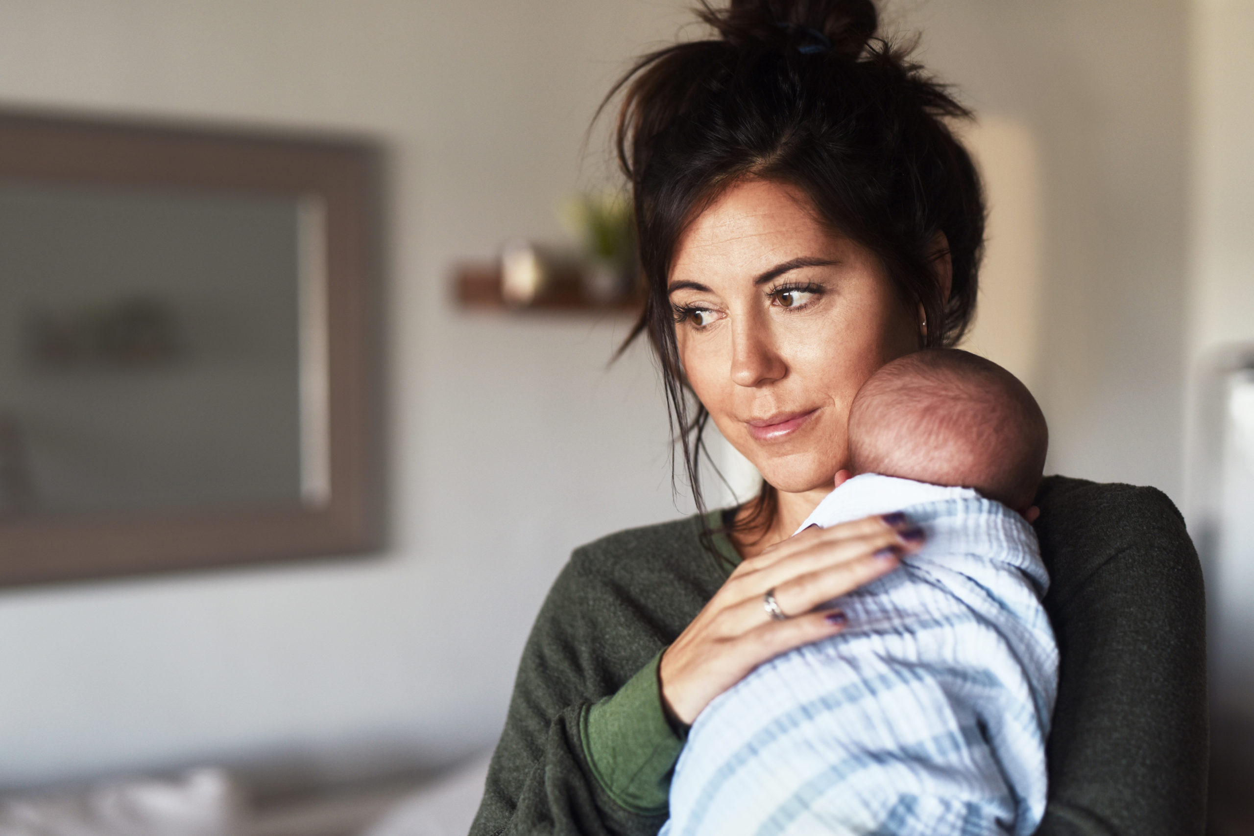 woman burping baby