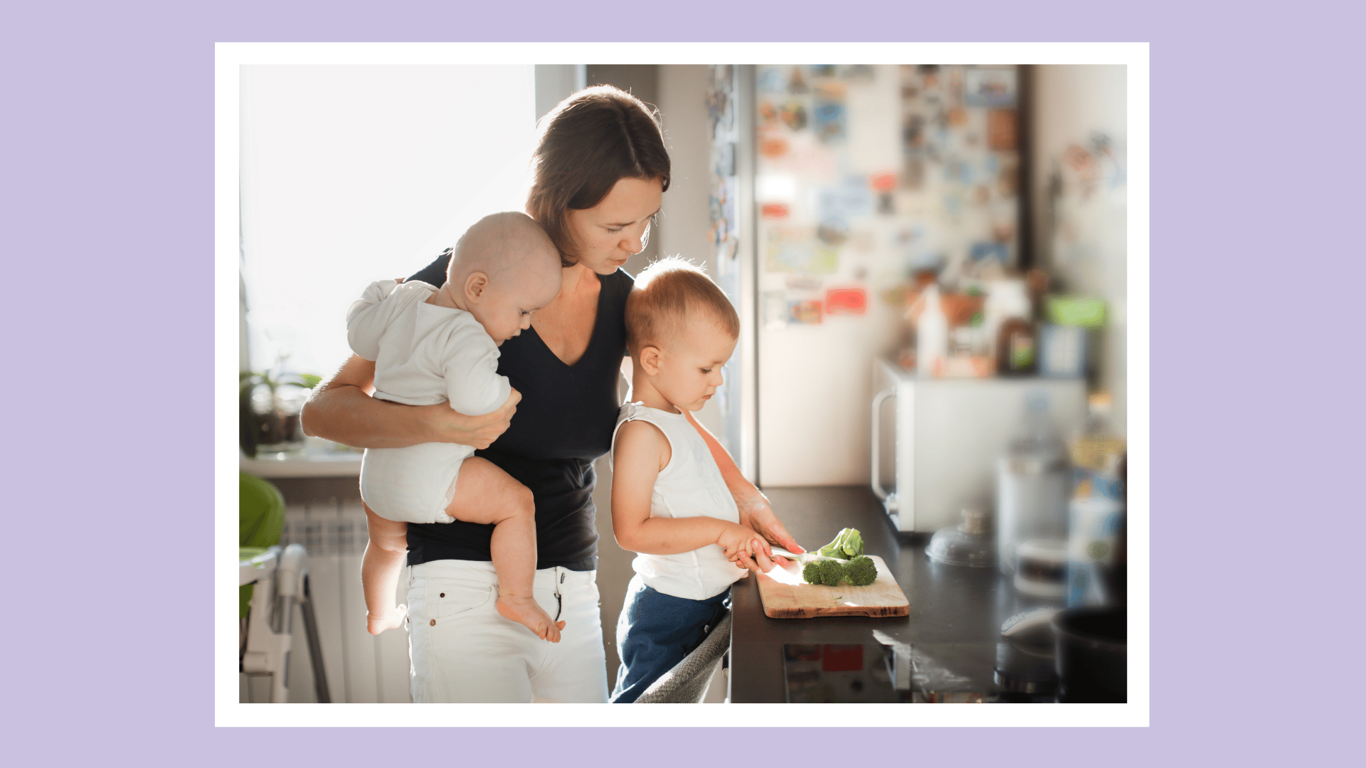 mom in the kitchen with two kids