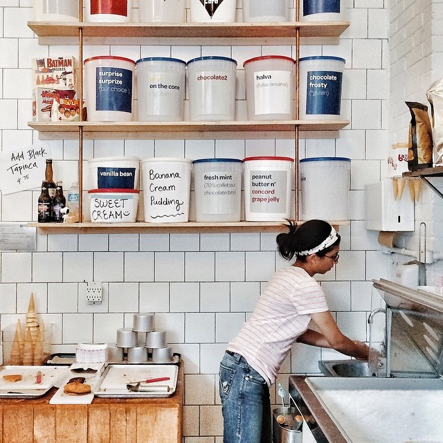 woman doing dishes in the kitchen